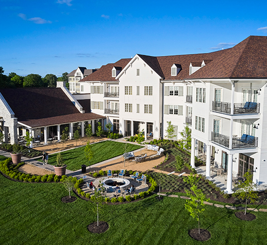 The Inn at Meadowbrook has courtyards that overlook tiered lakes and beautiful green space near Meadowbrook Park in Kansas City.